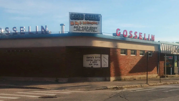 Brick corner pawn shop and crafts store with 'Good Still' and 'Gosselin' signs, street view