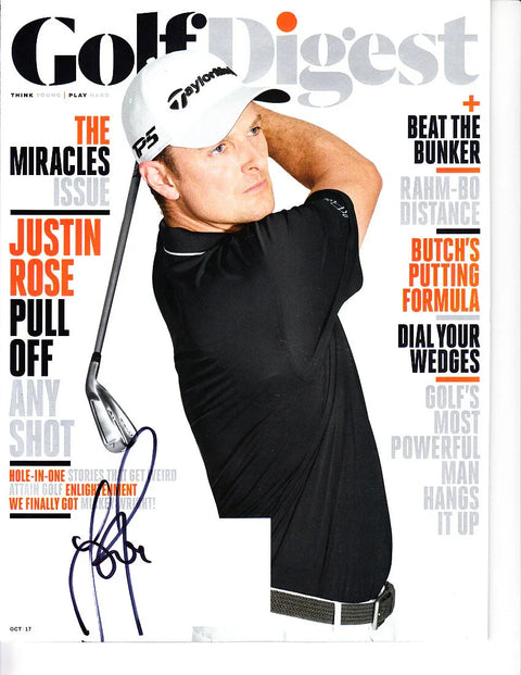 Autographed Golf Digest magazine cover featuring golfer mid-swing in black shirt and white cap.