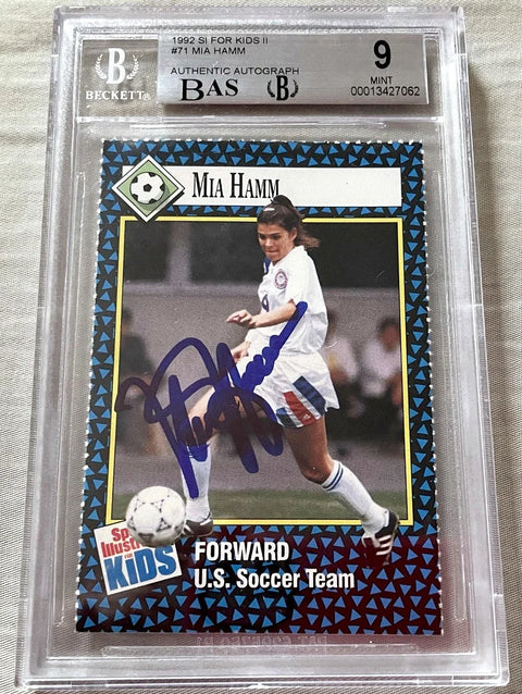 1992 Sports Illustrated for Kids soccer trading card, authenticated autograph, featuring player in white uniform kicking ball.