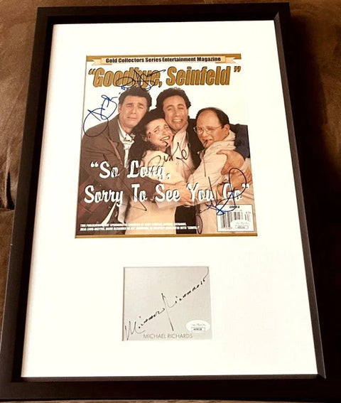 Framed autographed Seinfeld magazine cover with cast signatures and Michael Richards plaque