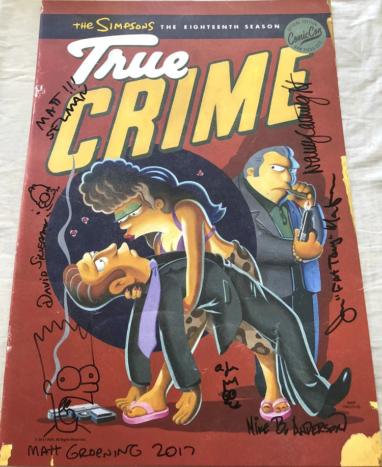 Signed The Simpsons True Crime poster, Comic-Con exclusive, with cartoon characters and autographs.