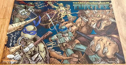 Signed Teenage Mutant Ninja Turtles poster featuring all four turtles and a monster villain.