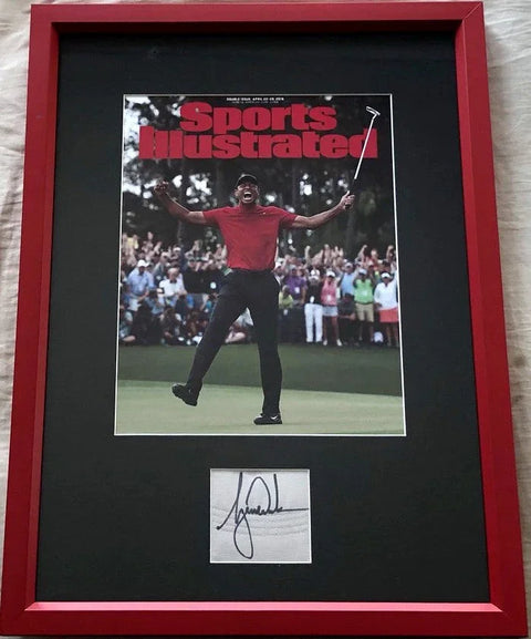 Framed Sports Illustrated cover photo of golfer celebrating with autograph display