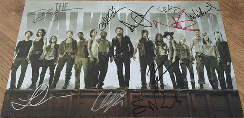 The Walking Dead cast signed photo, featuring main characters in a group, collectible memorabilia