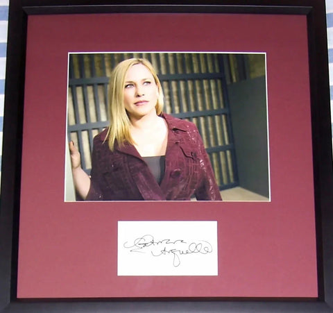 Framed celebrity autograph display with color photo and signed card, ideal Hollywood memorabilia