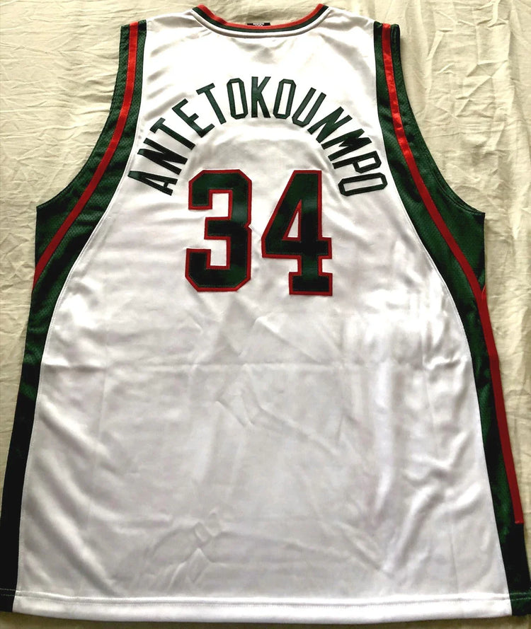 White retro basketball jersey number 34 with Antetokounmpo name, green and red accents