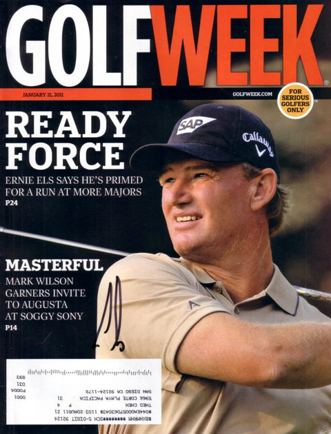 Signed Golfweek magazine cover featuring golfer swinging club, sports memorabilia