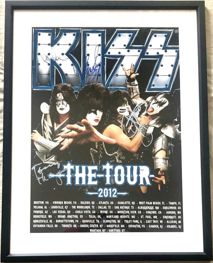 Framed KISS 2012 The Tour poster with band photo and multiple autographs