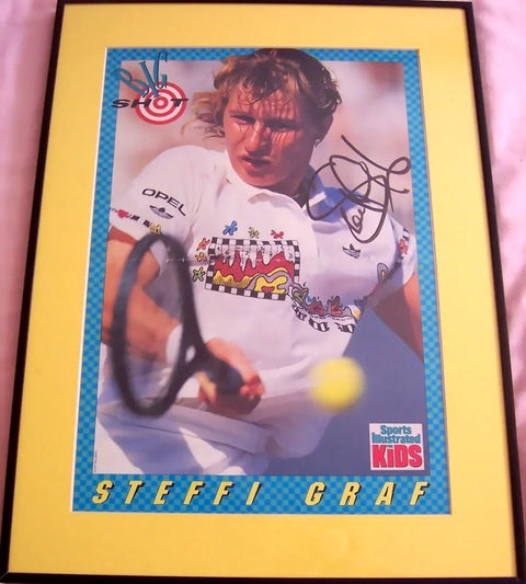 Framed Steffi Graf signed Sports Illustrated Kids tennis photo, yellow matting, swinging racquet.