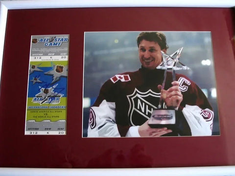 Framed NHL All-Star hockey autographed ticket and photo of player holding trophy