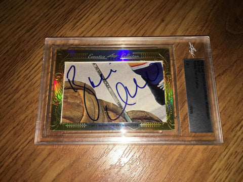 Hockey cut signature card in protective case, featuring bold autograph and gold-bordered design