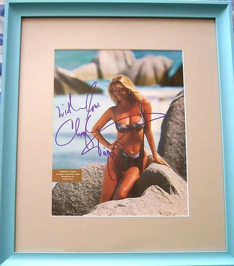 Framed signed swimwear model photo, autograph on beach background, collectible memorabilia