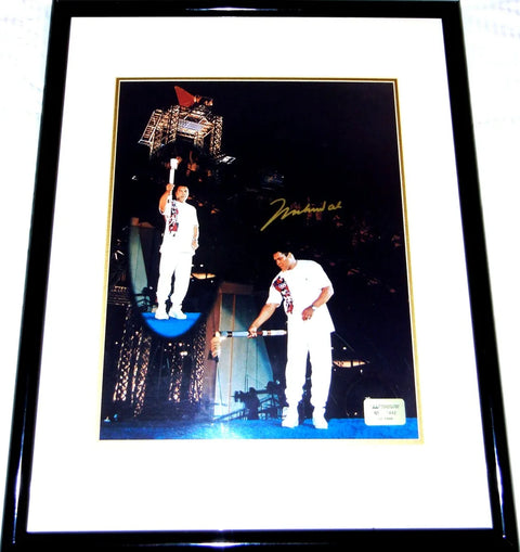 Framed Olympic torch relay photo with autographed signature, sports memorabilia