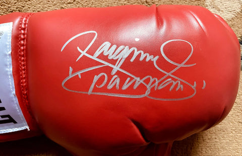 Red boxing glove with silver autograph, collectible sports memorabilia