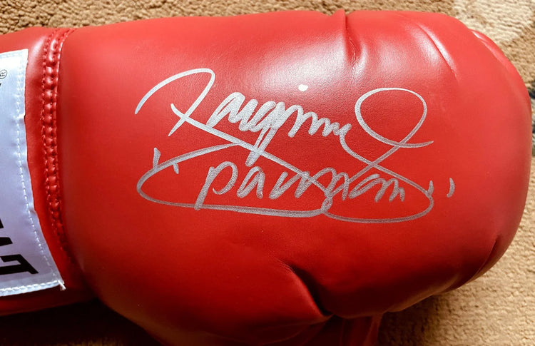 Red boxing glove with silver autograph, collectible sports memorabilia