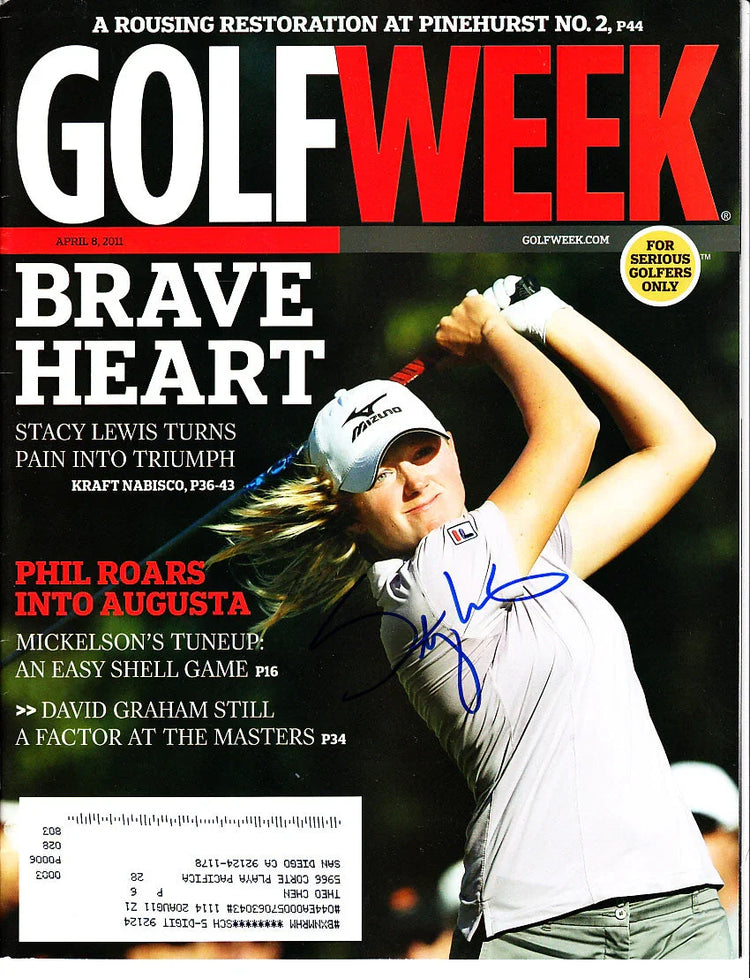 Signed Golfweek magazine cover featuring female golfer swinging club in tournament setting
