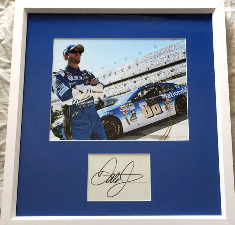 Framed NASCAR memorabilia with driver photo, No. 88 car, and signed autograph display