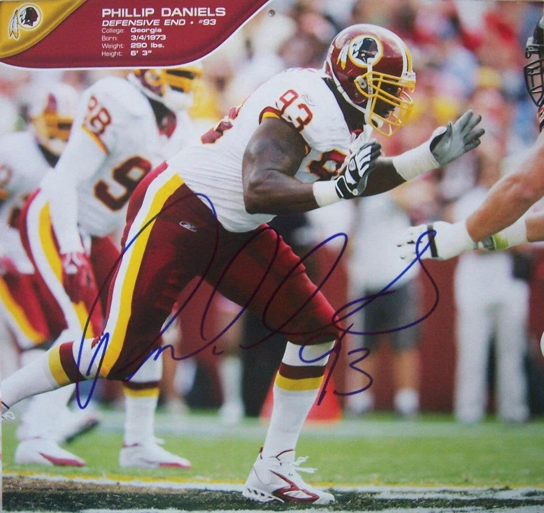 Phillip Daniels signed Washington Redskins calendar photo - AutographsForSale.com