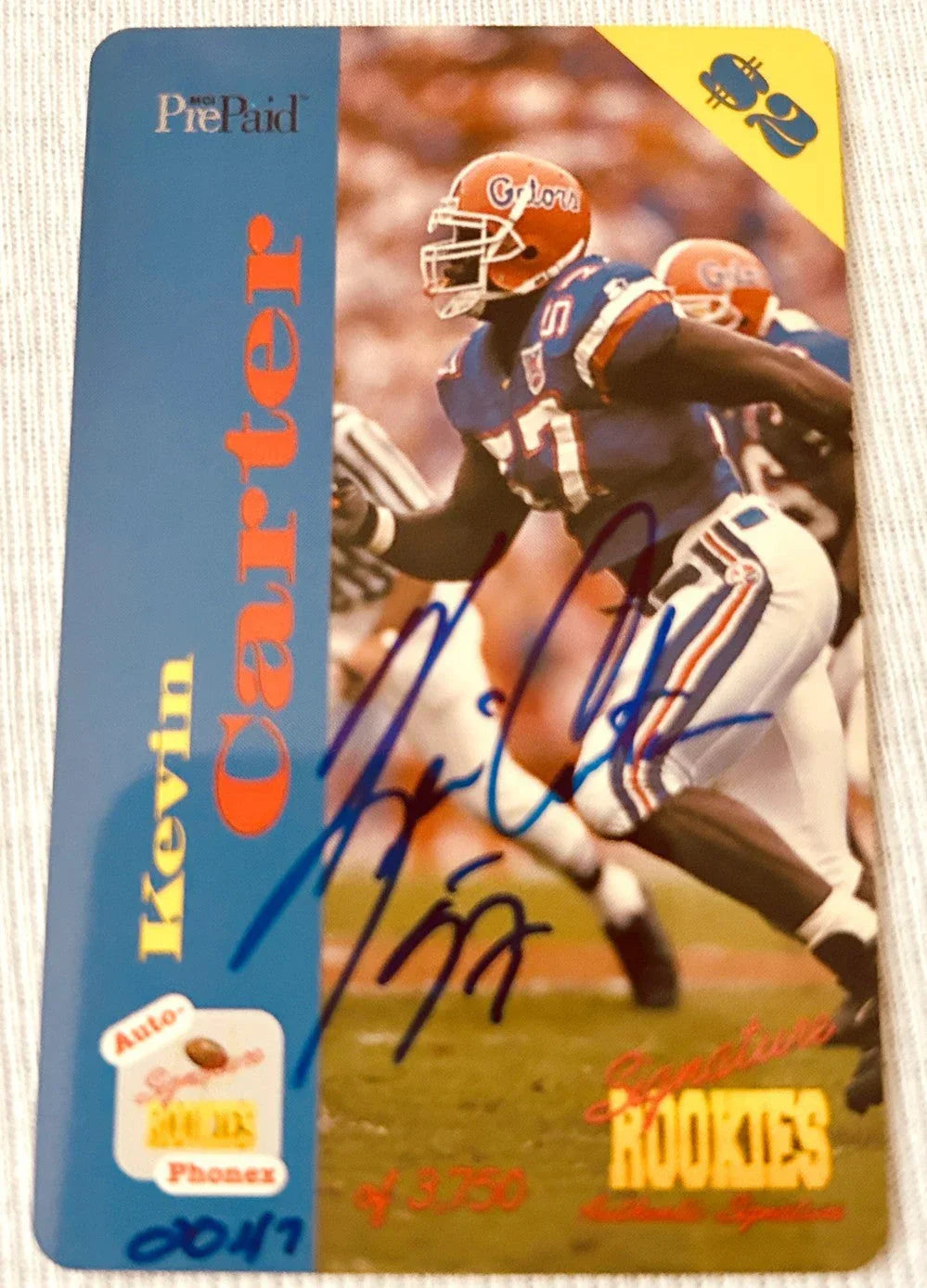 Kevin Carter certified signed Florida Gators 1995 Signature Rookies phone card - AutographsForSale.com