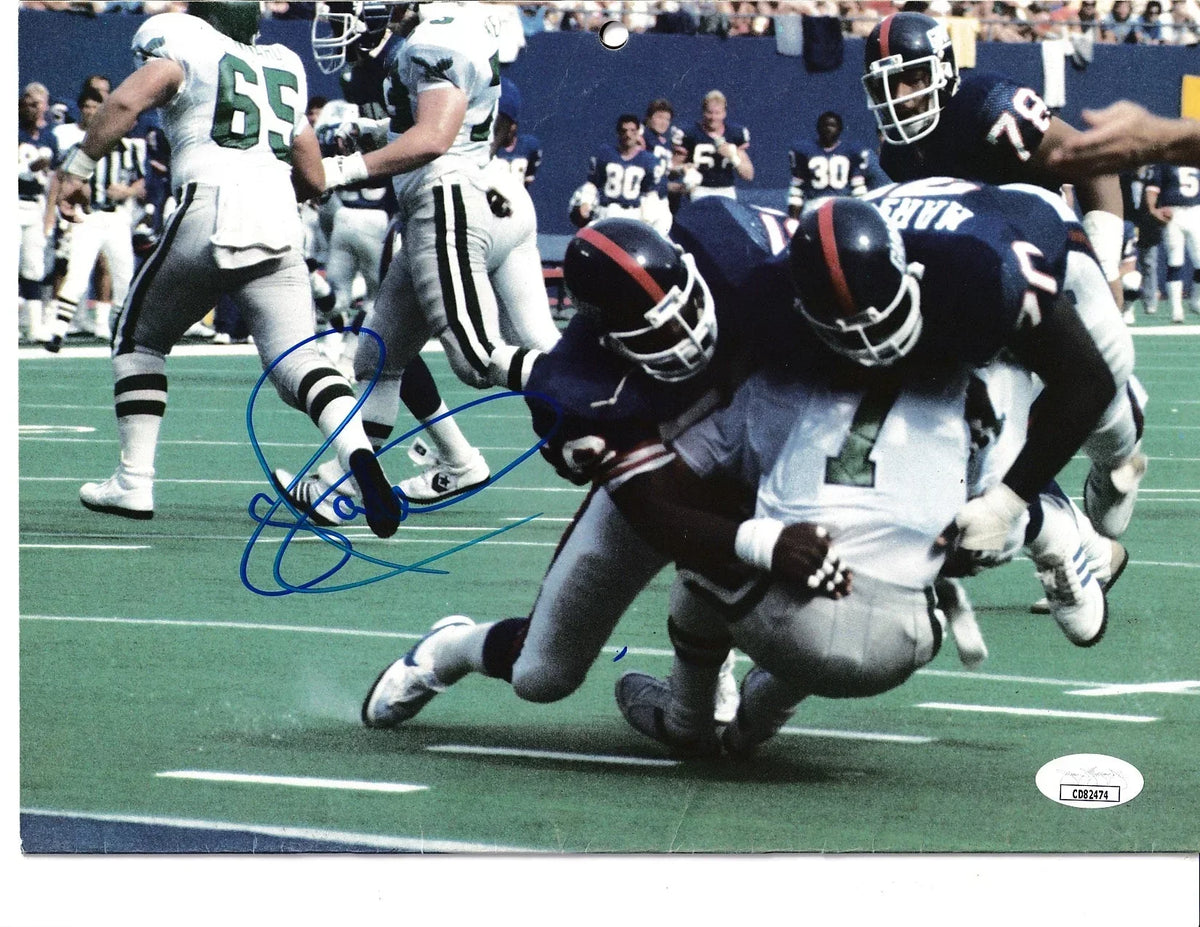 Lawrence Taylor signed NY Giants 1986 calendar photo JSA - AutographsForSale.com