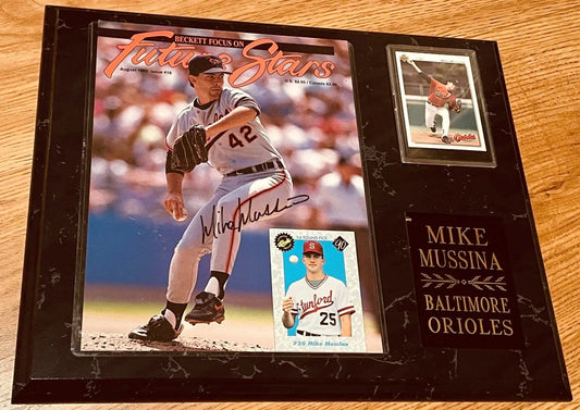 Mike Mussina signed Orioles cover mounted in plaque - AutographsForSale.com