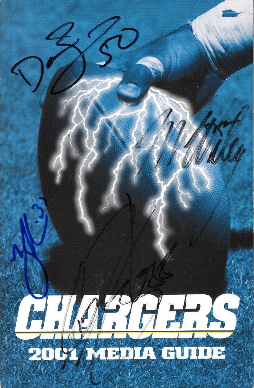 2001 SD Chargers media guide signed by Rodney Harrison David Binn Tim Dwight Marcellus Wiley - AutographsForSale.com