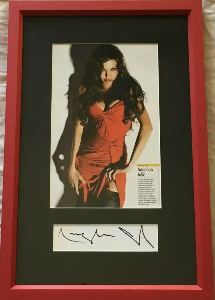 Angelina Jolie autograph framed with sexy magazine photo JSA - AutographsForSale.com