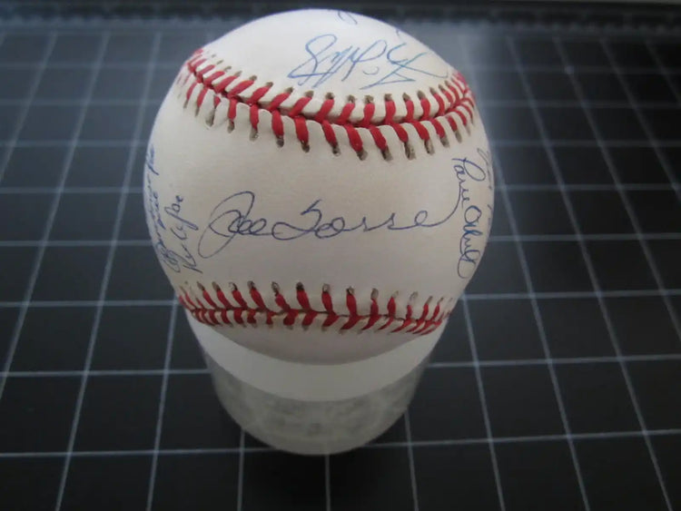 Official MLB baseball with multiple blue ink signatures, collectible sports memorabilia