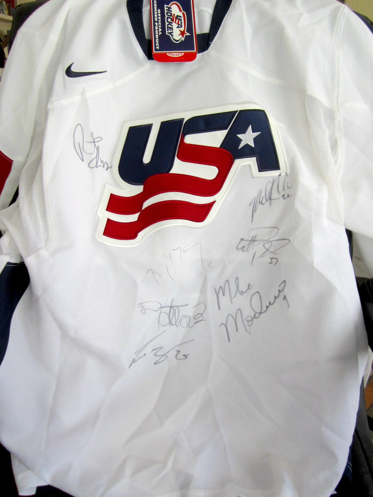 2006 US Olympic hockey team signed Nike jersey Mike Modano Scott Gomez Derian Hatcher JSA - AutographsForSale.com