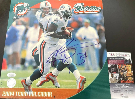 Ricky Williams signed Miami Dolphins 2004 calendar cover JSA - AutographsForSale.com