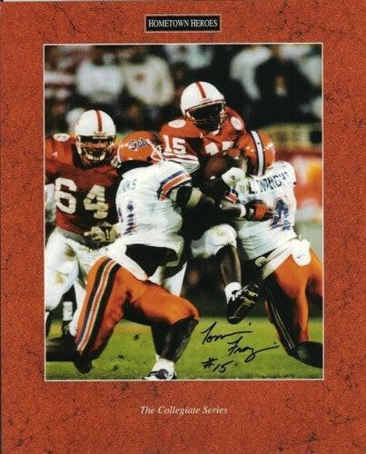 Tommie Frazier signed Nebraska 8x10 1996 Fiesta Bowl photo - AutographsForSale.com