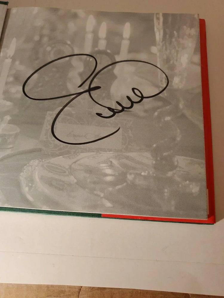 Emeril Lagasse signed Emeril’s Creole Christmas cookbook - AutographsForSale.com