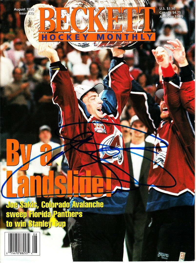 Joe Sakic signed Avalanche 1996 Stanley Cup Champions Beckett hockey cover framed JSA - AutographsForSale.com