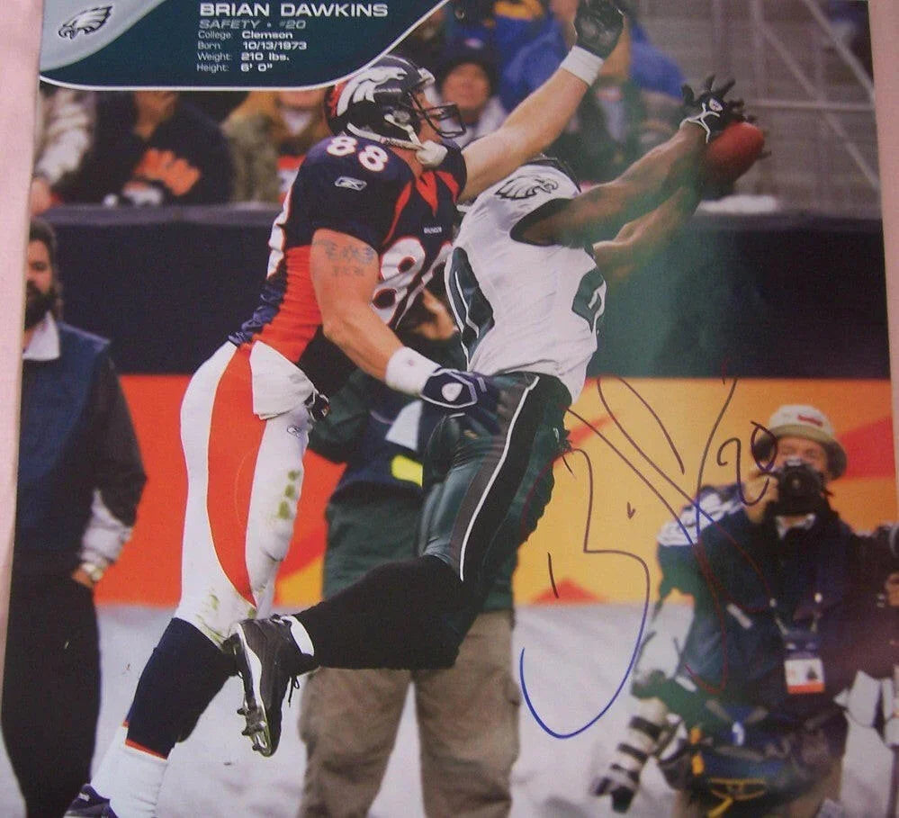 Brian Dawkins autographed Philadelphia Eagles calendar photo - AutographsForSale.com