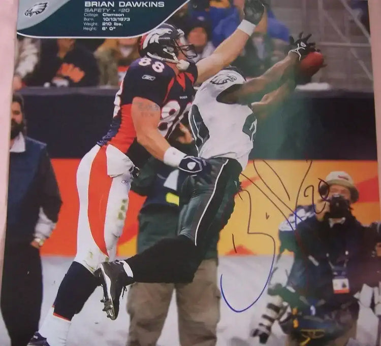 Brian Dawkins autographed Philadelphia Eagles calendar photo - AutographsForSale.com