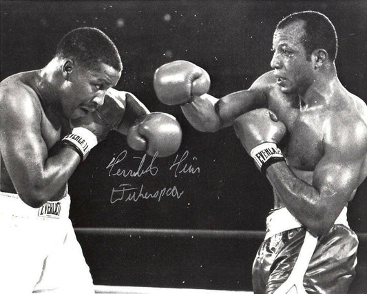 Tim Witherspoon autographed 8x10 boxing photo - AutographsForSale.com