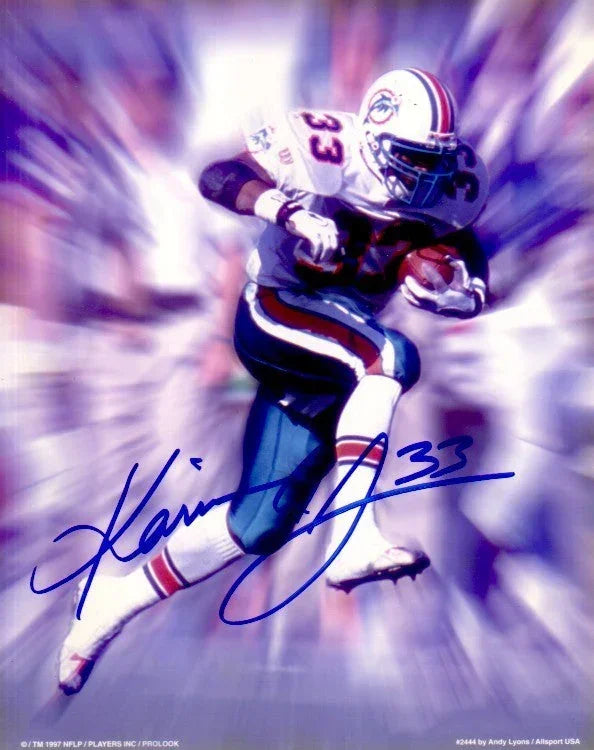 Karim Abdul-Jabbar autographed Miami Dolphins 8x10 photo - AutographsForSale.com