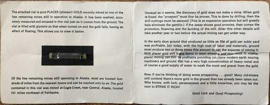 Alaska Placer Gold Flakes In Vial & Souvenir Folder - AutographsForSale.com
