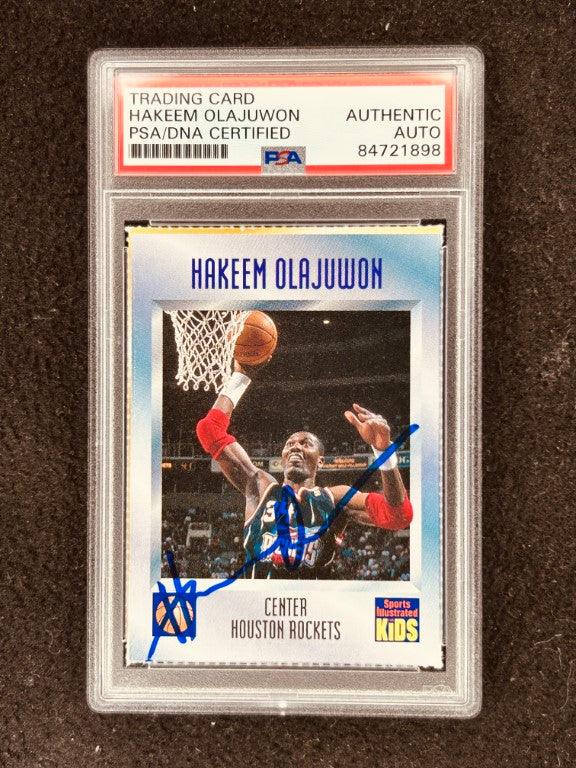 Hakeem Olajuwon signed Rockets 1997 SI for Kids card PSA/DNA - AutographsForSale.com