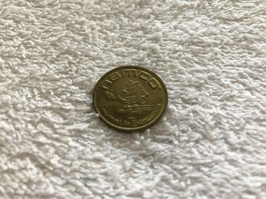 Namco Arcade coin operated vintage 1980s video game token - AutographsForSale.com