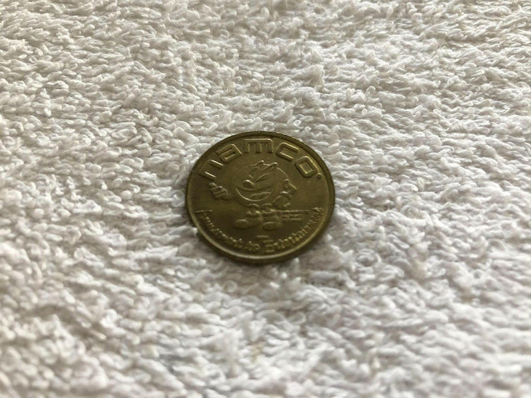 Namco Arcade coin operated vintage 1980s video game token - AutographsForSale.com