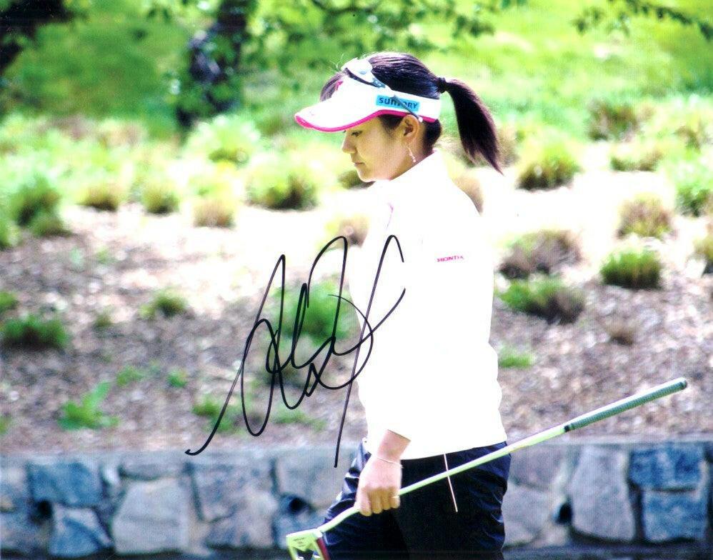 Ai Miyazato autographed 8x10 photo Walking with Putter - AutographsForSale.com