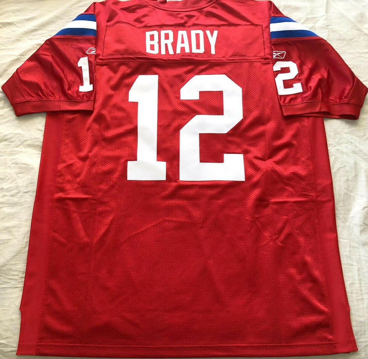 Tom Brady Patriots Reebok 2009 red game model third jersey NEW - AutographsForSale.com