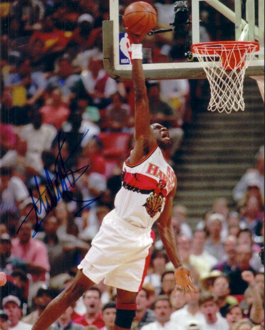 Dikembe Mutombo autographed Atlanta Hawks 8x10 photo - AutographsForSale.com