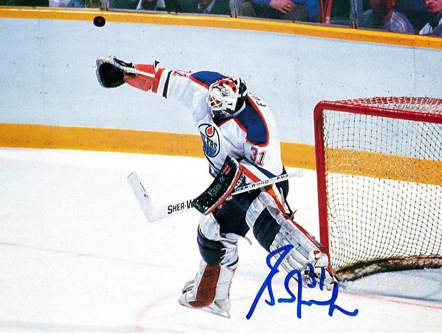 Grant Fuhr signed Edmonton Oilers 7x9 magazine action photo - AutographsForSale.com