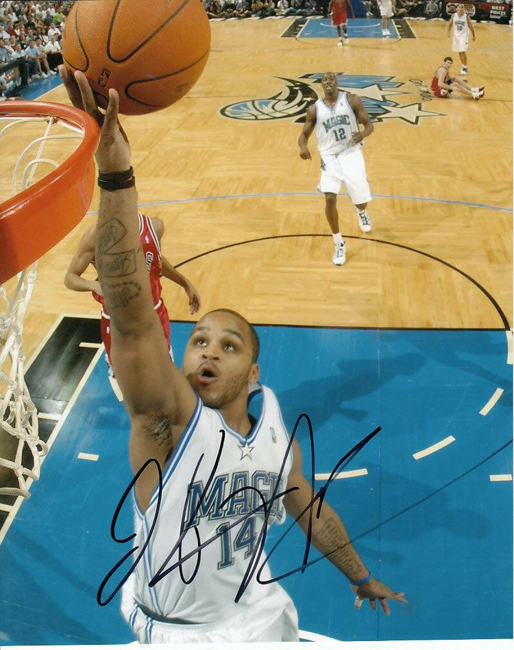 Jameer Nelson autographed Orlando Magic 8x10 photo - AutographsForSale.com