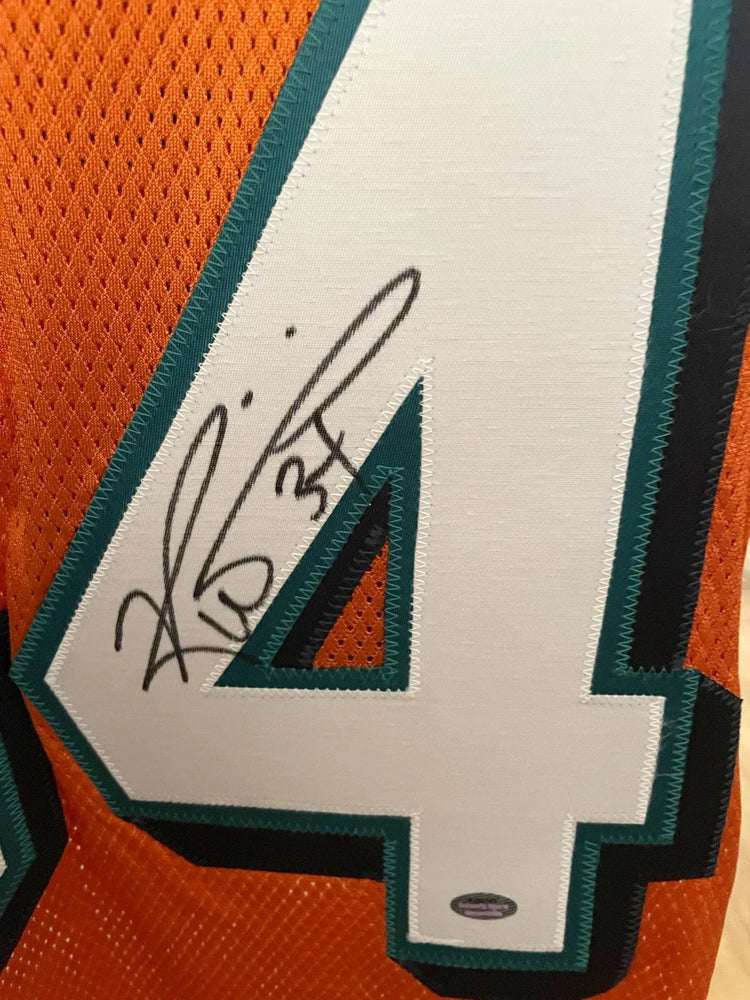 Ricky Williams signed Dolphins Reebok orange jersey SCHWARTZ - AutographsForSale.com