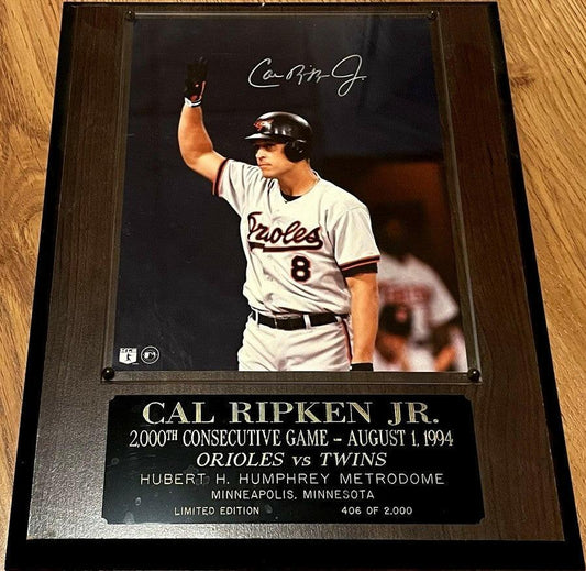 Cal Ripken autographed Orioles 2000 Consecutive Games 8x10 photo in plaque - AutographsForSale.com