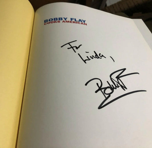 Bobby Flay autographed Cooks American hardcover cookbook (For Linda) - AutographsForSale.com