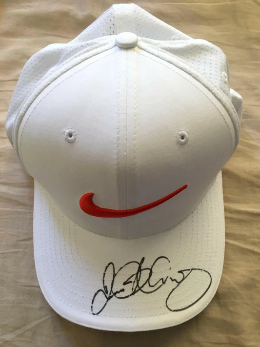 Rory McIlroy autographed white and orange Nike Golf cap or hat JSA - AutographsForSale.com